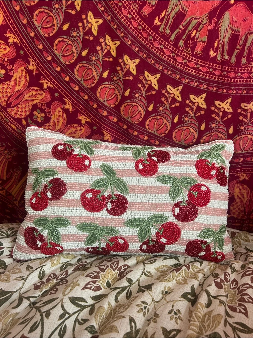 Viral beaded cherry pillow